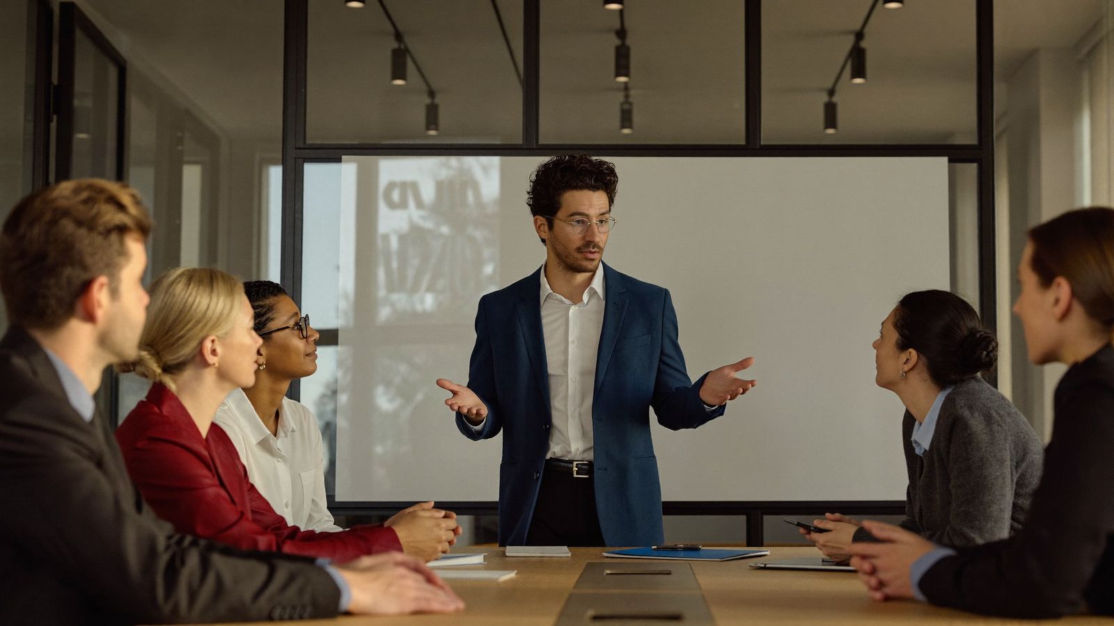 A Vexabit consultant presenting a technology strategy to a client team